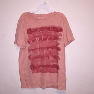 Peach Calvin Klein shirt